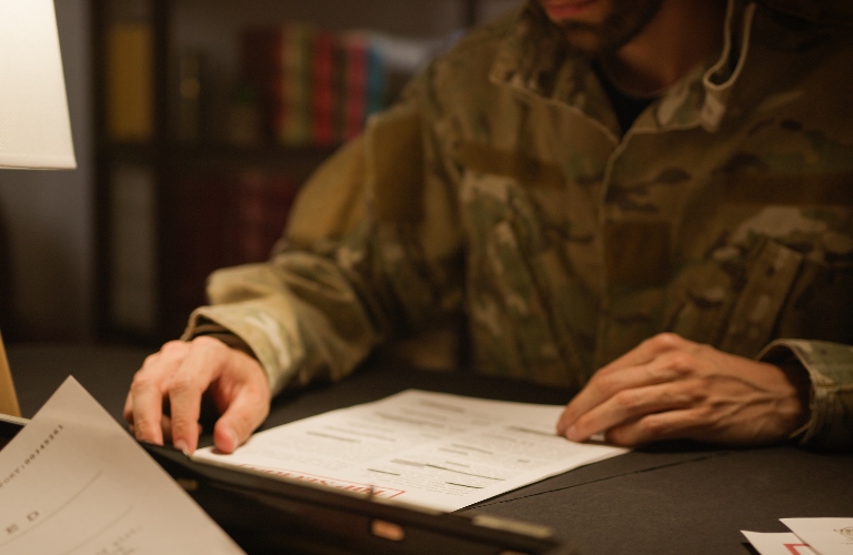 Solider reading paper